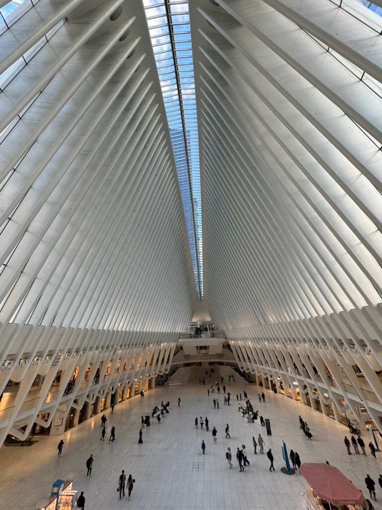 The interior of the World Trade Center Oculus, white ribbed vaults soaring over the marble concourse